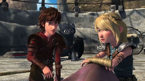 hiccup and astrid with toothless by their side from dreamworks dragons race to the edge