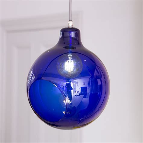 dark blue glass globe pendant light william glow lighting