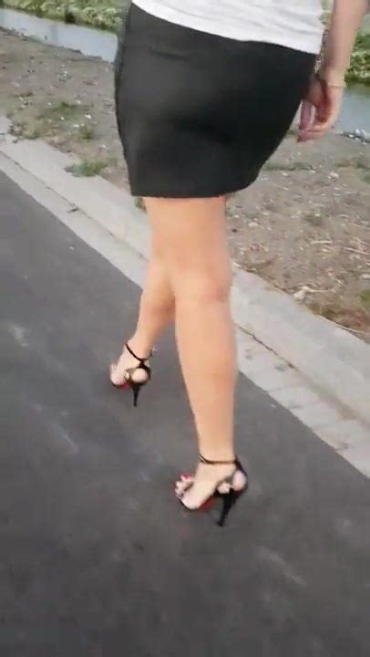 hot russian milf walking outdoors high heels nylons ass