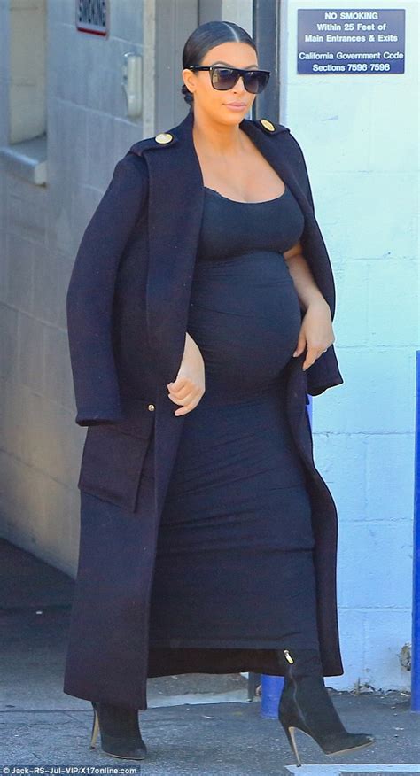 Pregnant Kim Kardashian Almost Spills Out Of Bodycon Maxi Dress In La