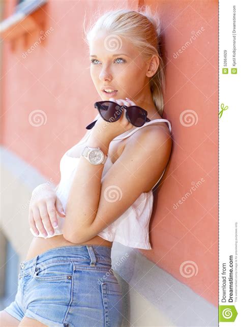 beautiful teenage girl leans against the wall stock image image of posing european 52664929