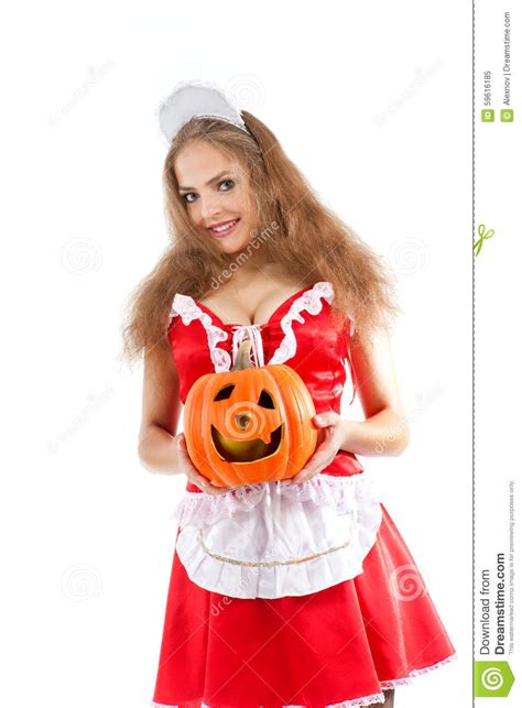 costume series maid holding halloween pumpkin stock image