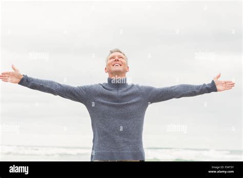 man standing  arms  wide stock photo alamy