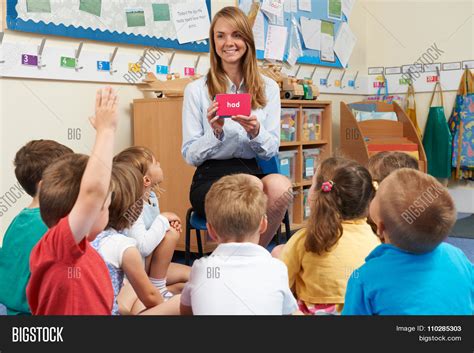 teacher showing image and photo free trial bigstock