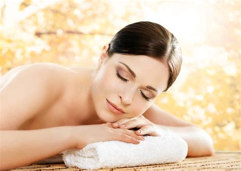 young  beautiful girl relaxing   spa salon stock photo image