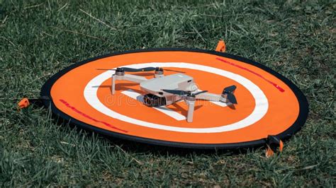 dji mavic mini  drone  orange landing mat pad editorial image image  accessories graded