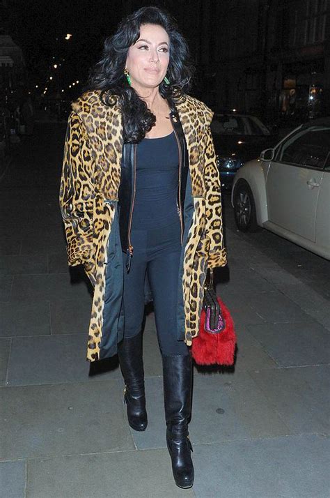 Nancy Dell Olio Turns Heads In Leopard Print Coat And Knee