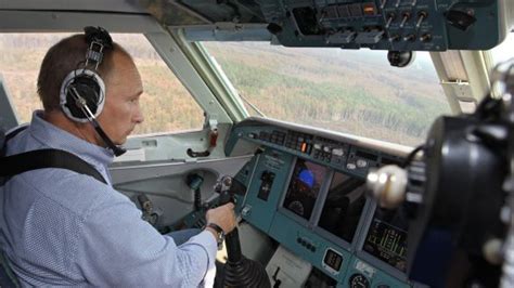 co pilot putin helps put out wildfires