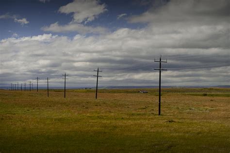 row  utility poles   prairie photograph  randall nyhof fine art america