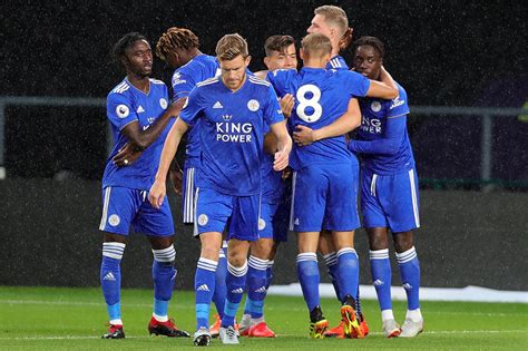 uche strikes  leicester  top  division