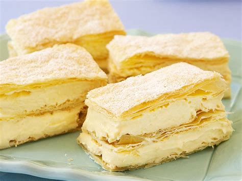 creamy vanilla custard  layers  light pastry dusted  icing