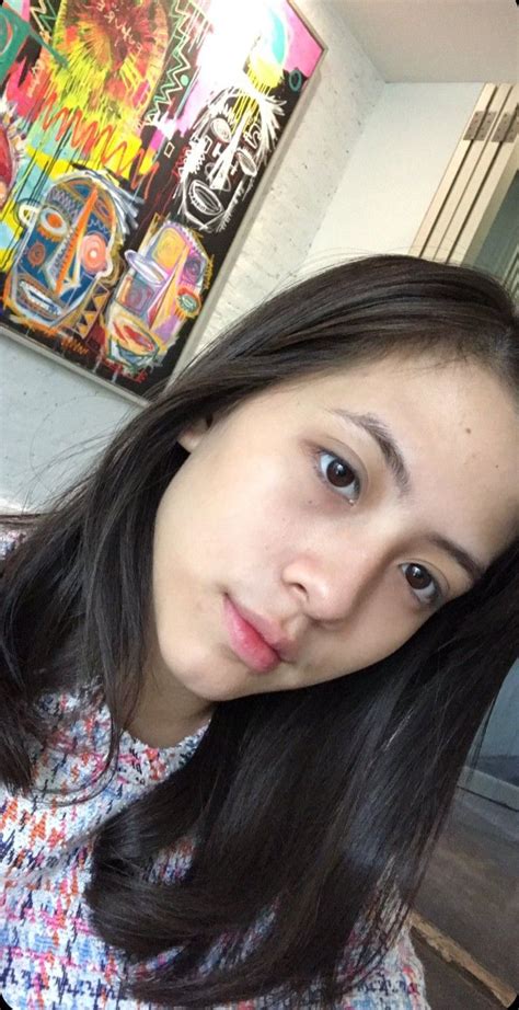 Indonesian Beauty Captivating Selfie In Front Of Art