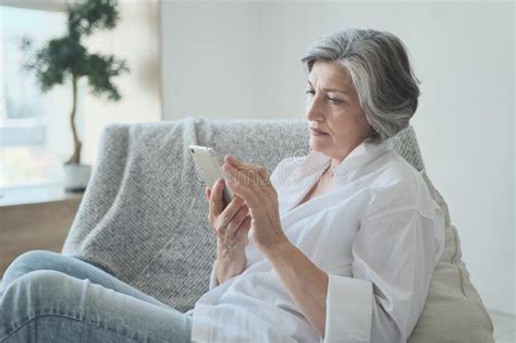Mobile Addicted Senior Mature Woman Use Smartphone All Time At Home
