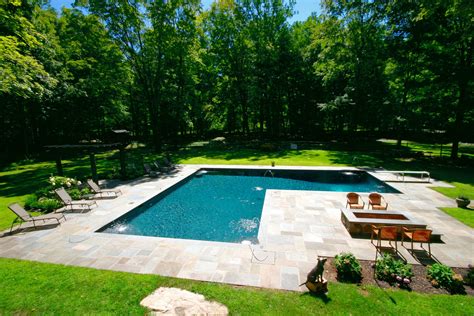shaped  ground gunite pool complete  diving board corner fountains  sports inserts