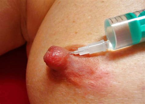 injection saline breast saline injection and tits torture 6 bilder