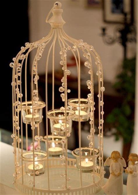 219 best bird cage wedding images on pinterest flower arrangements flower decorations and