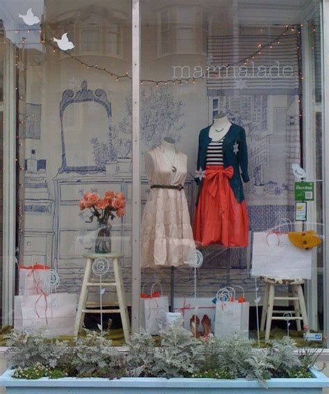 pin  sarah jane   lane  clothes boutique window displays boutique decor store