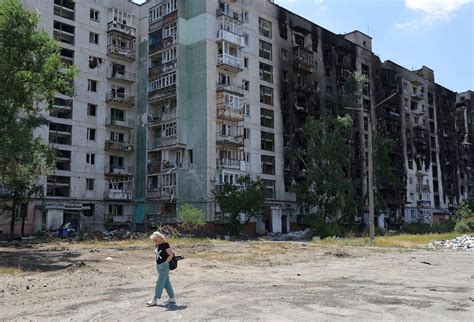 ukrainians from occupied luhansk struggle to make new lives elsewhere