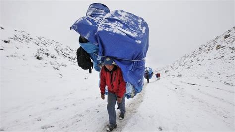 everest sherpas scale nepal side after two year gap bbc news