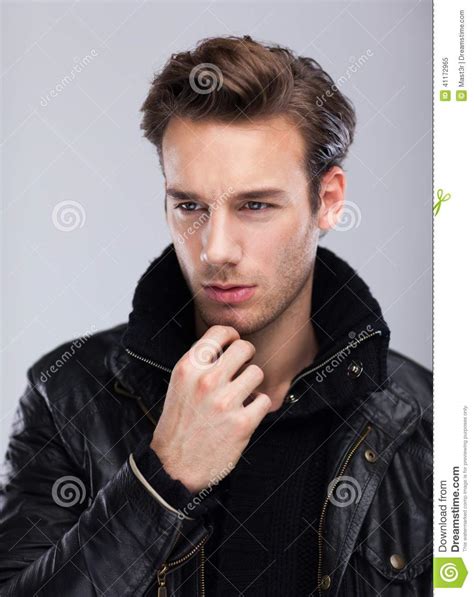 Fashion Man Face Close Up Over Gray Background Stock