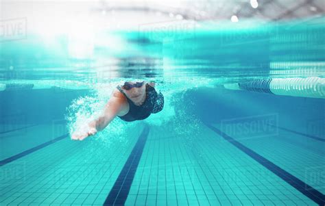 swimmer racing  pool stock photo dissolve