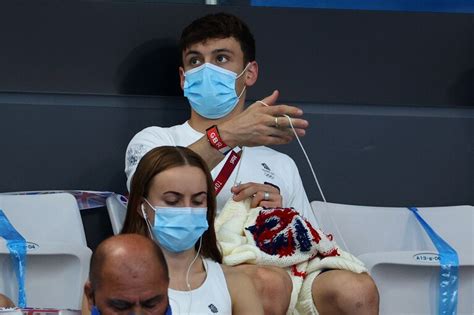 british diver tom daley knits in stands at tokyo olympics the