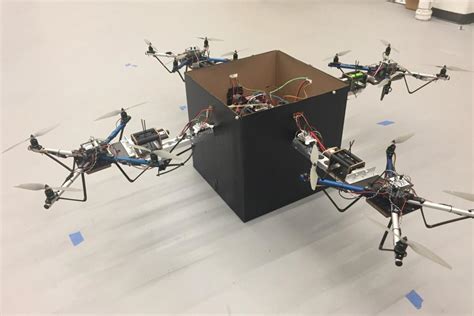 collaborative tech lets drones work   lift heavy loads