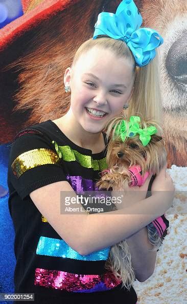 dancer jojo siwa  dog bobo arrive   premiere  warner bros