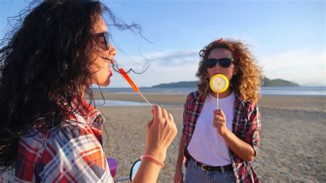 Naughty Girl Licking Lollipop At Beach Stock Footage Video