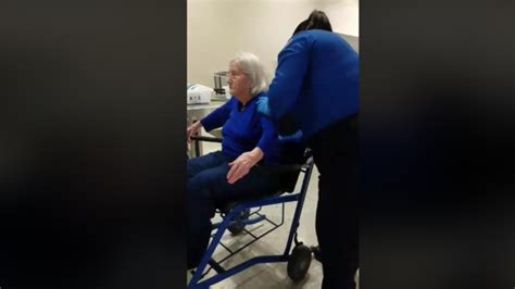 video of tsa agents searching 96 year old woman in wheelchair sparks