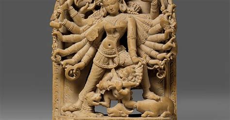 sculpture of the goddess durga slaying the demon buffalo mahisha india