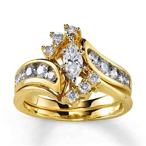 yellow gold marquise engagement rings wedding  bridal inspiration