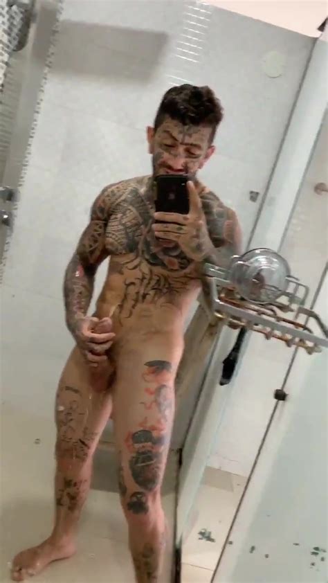 hot tatted muscle guy pissing himself