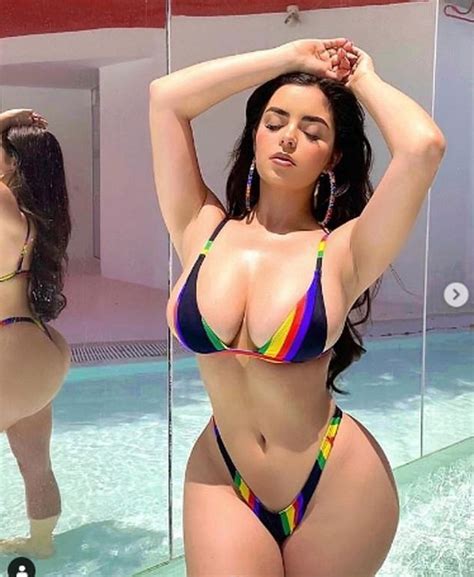 demi rose s boobs pour from tiny bikini as she showcases every inch of