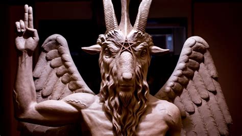 decoding  symbols  satans statue bbc news