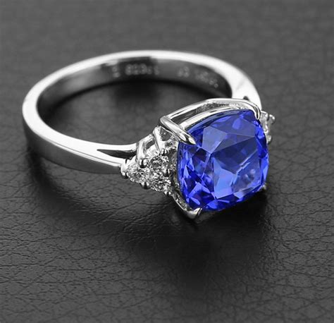 1 50 Carat Blue Sapphire And Diamond Halo Engagement Ring