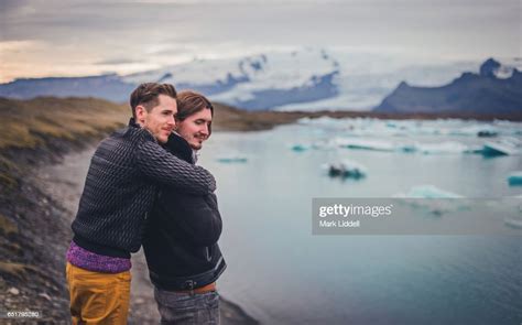 Affectionate Gay Couple Hugging At Jokulsarlon Glacier Lagoon Iceland
