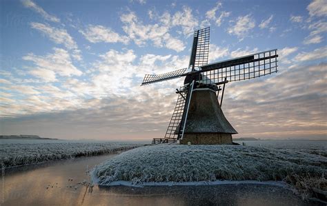 Old Dutch Windmill At Sunrise In Winter By Marcel