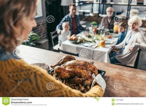 Close Up Shot Of Woman With Thanksgiving Turkey For