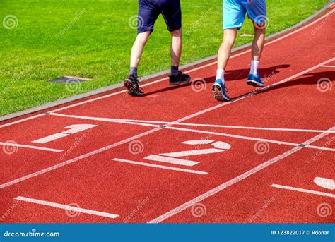 running legs  shadow   male athlete running  track stock image image  health east