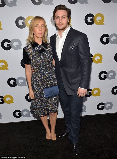 aaron taylor johnson 23 keeps wife sam 46 warm as he visits her on