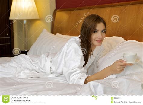 Sexy Brunette With Make Up In Dressing Gown Stock Image