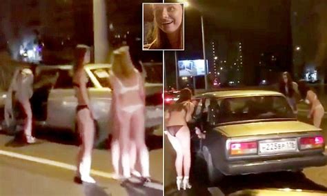 russian women strip to their underwear and beg people for