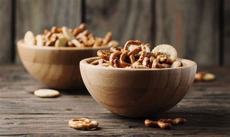 wooden bowls filled  nuts  top   table