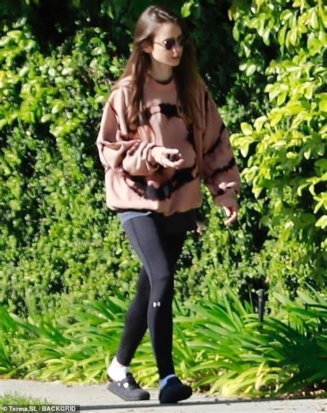 lily collins cuts a casual figure as she enjoys self isolated walk in