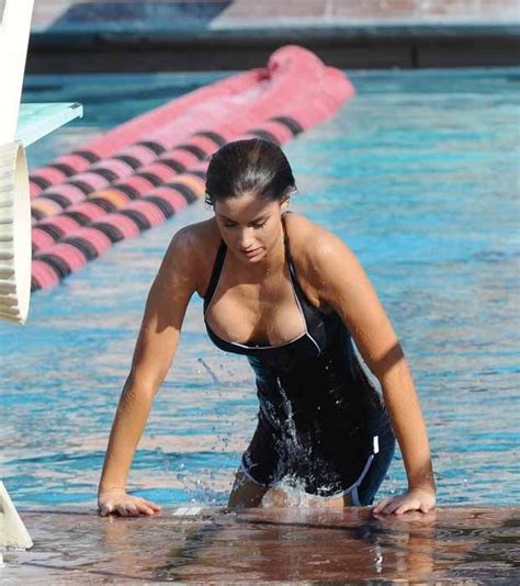 Katherine Webb Nearly Pops Out Of Her Swimsuit While