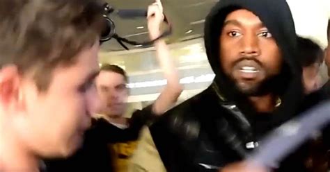 Kanye West Tries To Stop A Paparazzi Fight By Giving One Of Them A Hug