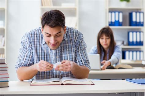students sitting  studying  classroom college stock image