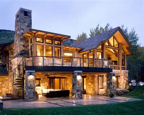 walkout basement house plans   rustic exterior   stacked stone house  aspen projects