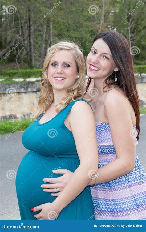 Pregnant Blonde Woman Lesbian Girl With Girlfriends Brunette Stock